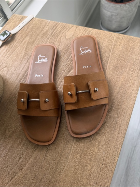 Christian Louboutin Shoes - Christian Louboutin Brown Leather Slide Mules with Buckle Detail
